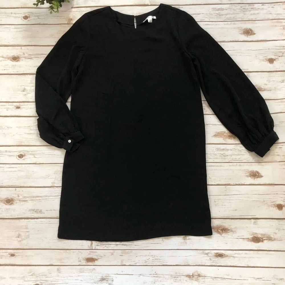 Reyna Couture black blousant sleeve dress